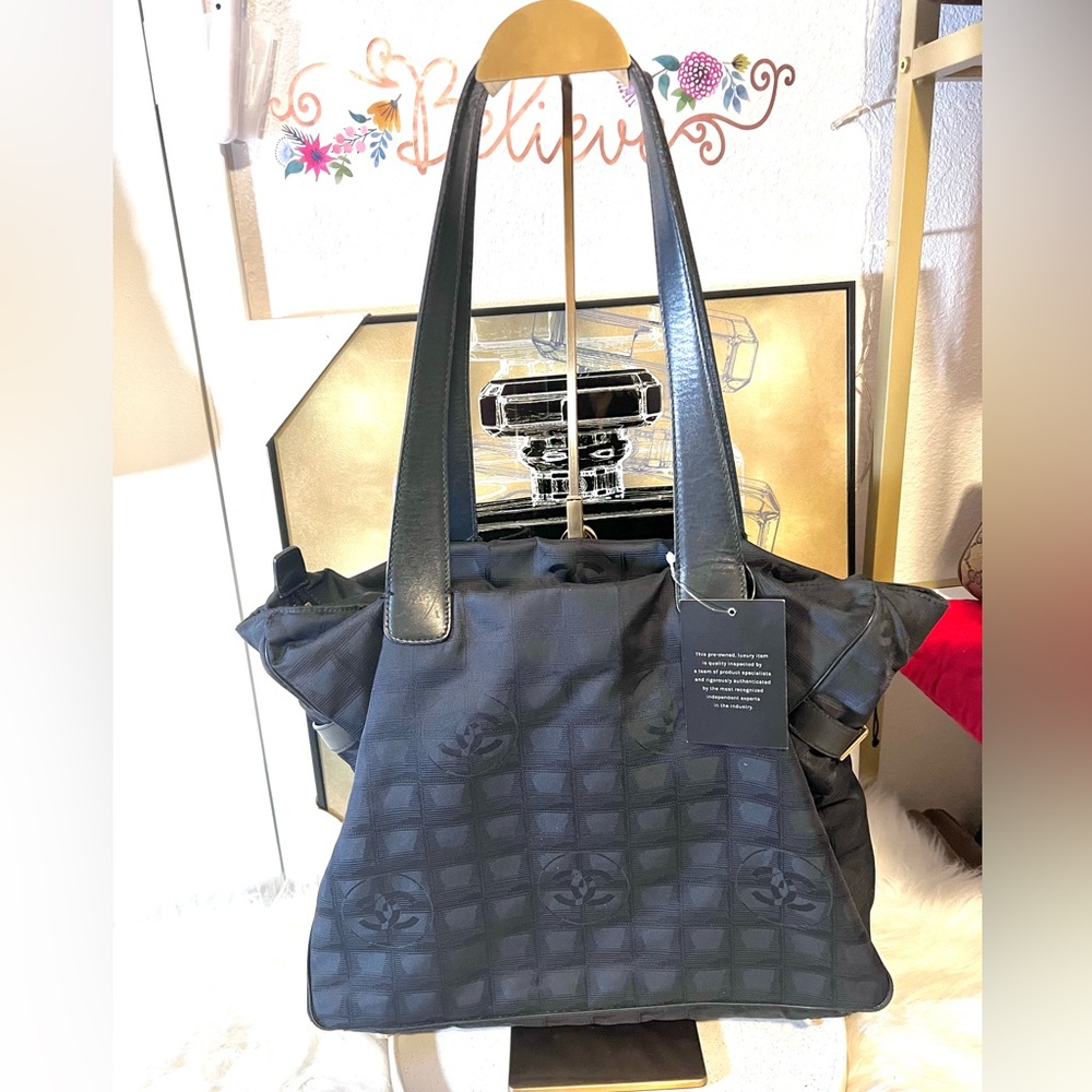 Authentic Chanel Travel Line Tote GM. Excellent preloved condition. Comes w/ COA